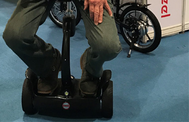 Airwheel S8mini saddle equipped electric scooter.